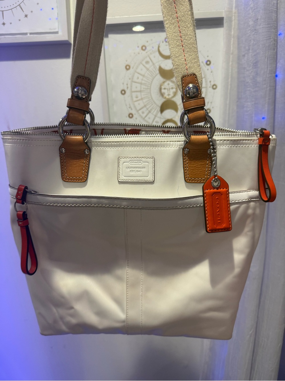 White and orange coach bag